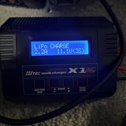 Battery Charger , Good Charger Has A Lot Of Connectors And Settings 