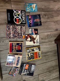 Box of Olympic and sports books vintage