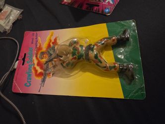 vintage "Crawling Soldier" wind-up toy