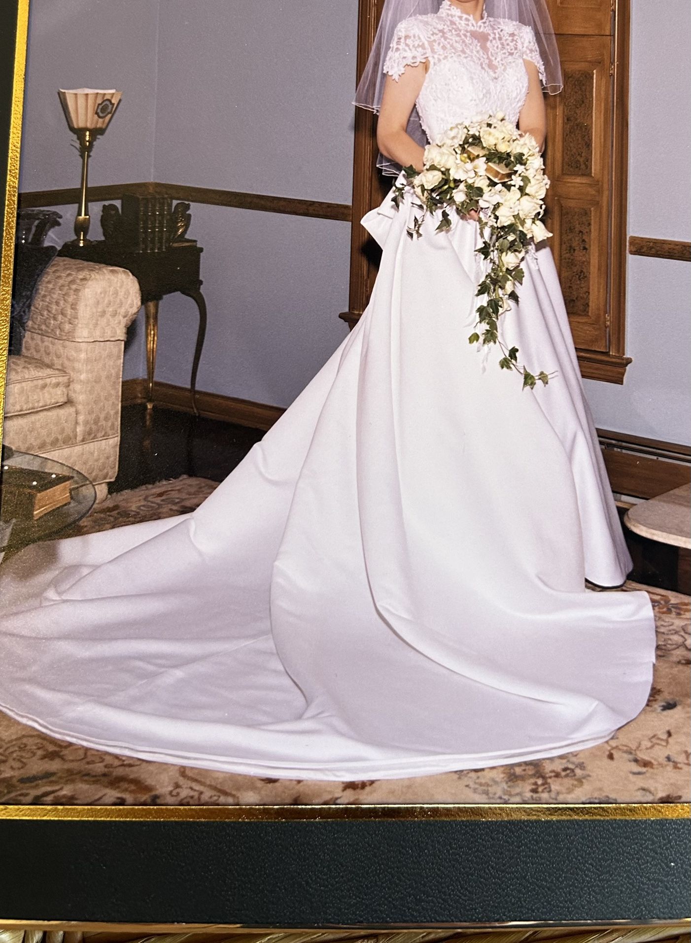 Wedding Dress Size 10. Still Available. Professionally cleaned and preserved and is like new. $225 or Best Offer