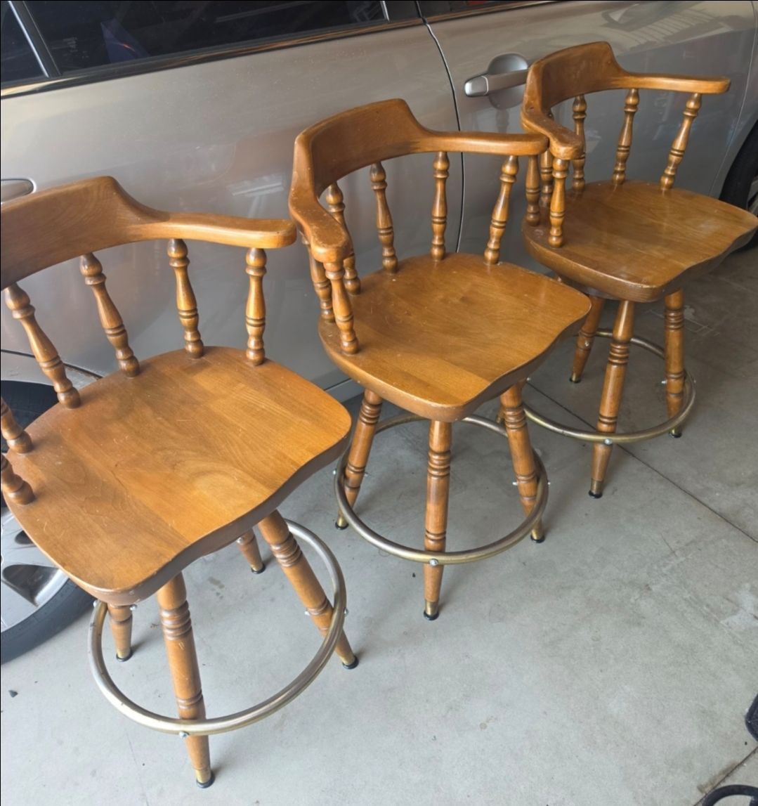 3 wooden swivel barstools