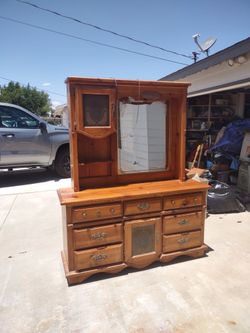 This dresser is made out of real wood and is 50 Dollars
