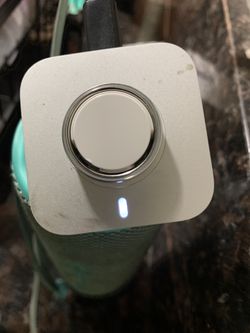 Oura gen 5 silver ring and charging dock