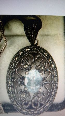 Vintage sterling silver blue topaz pendant on chain