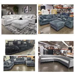 NEW 11X11FT SECTIONAL COUCHES. PAISLEY GUNMENTAL, LIGHT GREY, PAISLEY BLACK  AND SILVER FABRIC 