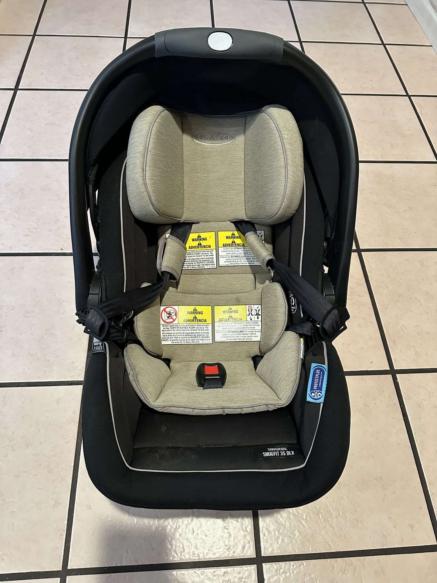 Graco SnugRide SnugFit 35 DLX Infant Car Seat Featuring Safety Surround - Jacks