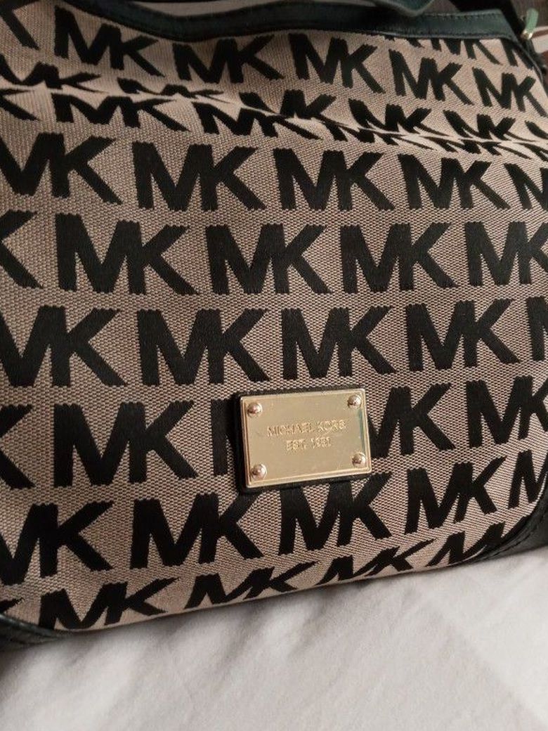 Auth. Like New Michael Kors EST.1981 Black Leather With Mk Printed On Outer Part Of Med/large Handbag.