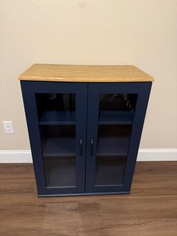 For Sale: Like-New Blue Bookcase with Glass Doors – $150 OBO