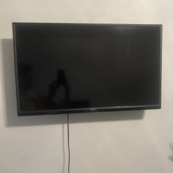 32 inch TV (comes with LED lights on back if you want)