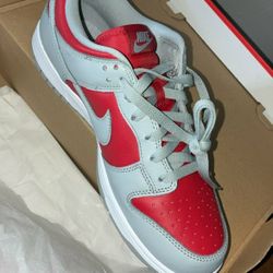 Nike Dunk Low QS 'Ultraman' in Varsity Red and Silver. 