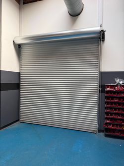 Metal rollup door 10’. By  10’