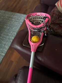 STX girls lacrosse stick with eye gear,, ball, and bag pink great condition