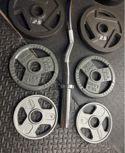 NEW Olympic Equipment Curl Bar of 20# with Cooper Bearings and Plates 2X35s, 2X25s, 2X10s and 2X5s pounds. Brute 170#