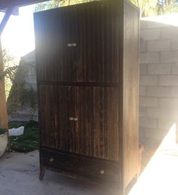 Armuar I wouldn't get rid of it but I moved into a small home so have to let it go $60 or best offer