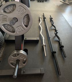 STANDARD SET: (1) THREADED STRAIGHT BAR, (1) EZ CURL BAR, (1) SUPER CURL BAR, (1) WEIGHT TREE, (2) 5 LB PLATES, (4) 10 LB PLATES
