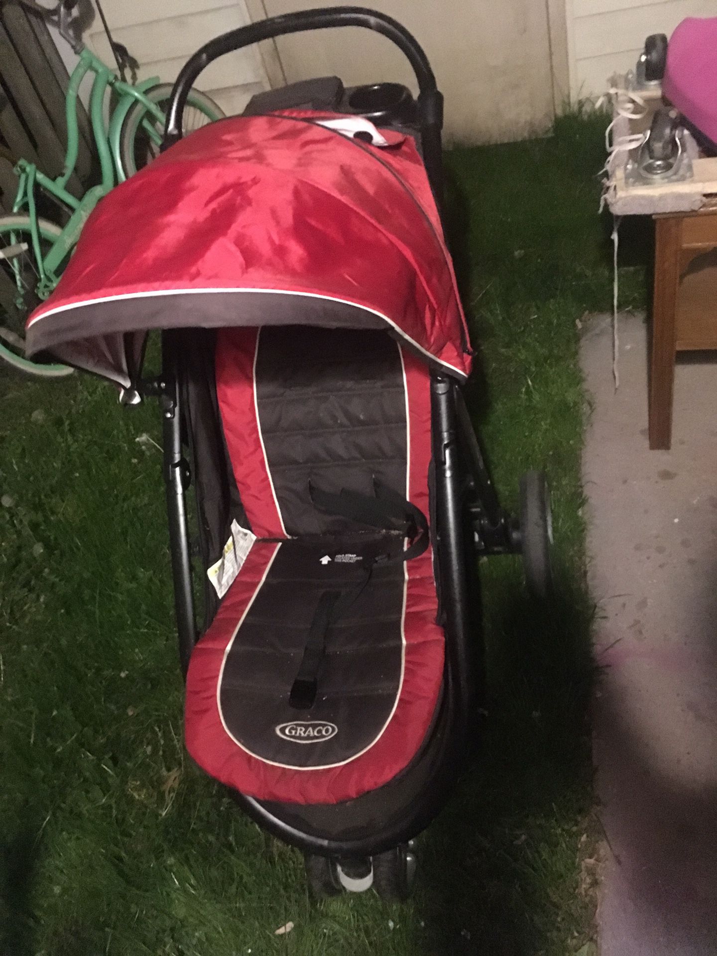 Graco AIRE 3 stroller and infant seat holder.