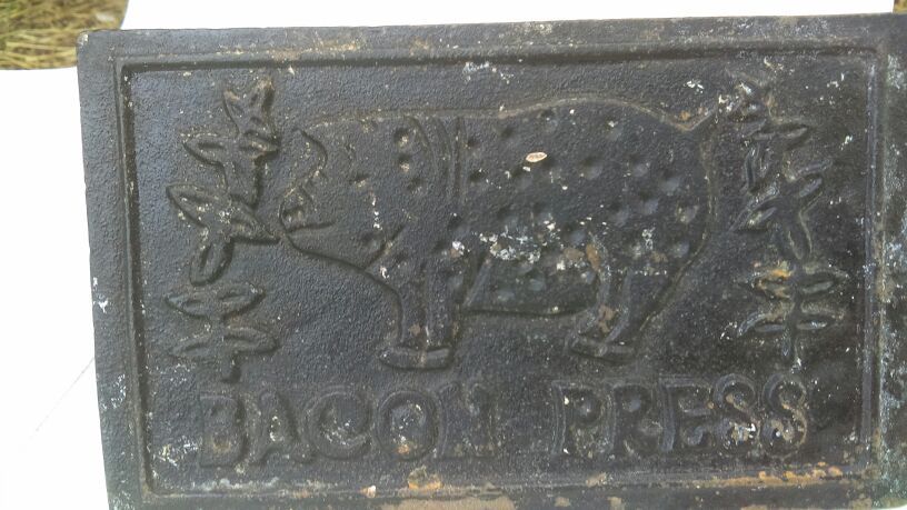 Cast iron bacon press