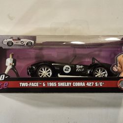 JADA 1:32 SCALE METAL DIECAST.  DC. TWO-FACE.  1965 SHELBY COBRA 427 S/C WITH TWO-FACE METAL DIECAST FIGURE. 