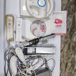 Nintendo Wii White RVL-001 – Bundle with 2 Controllers, 2 Nunchuks, Wheel + Mario Game
