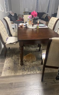 Ashley 70 X 42” Seat 6 and Extendable To Seat 8 !