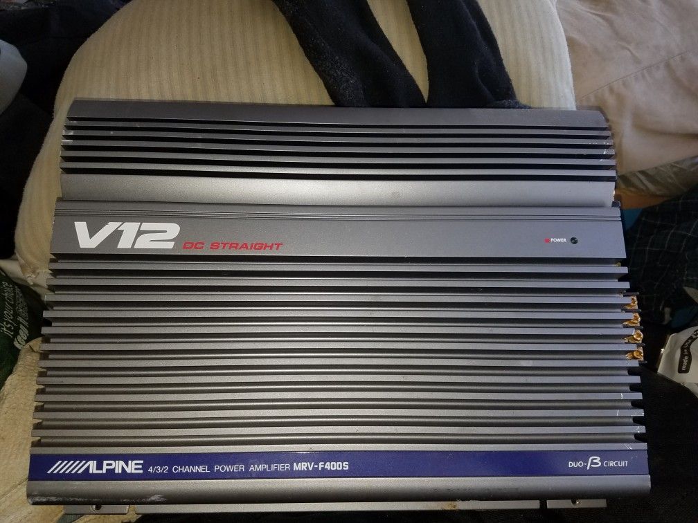 Alpine 4/3/2 channel amp 400 watts used in one vehicle
