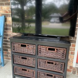 42” Sony Tv And Wicker Cabinet