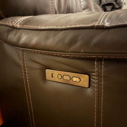 Electric leather reclining sofa