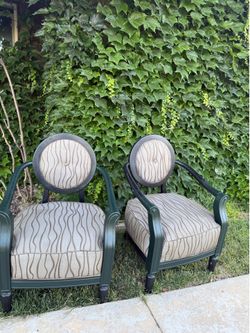 Pair of round back accent chairs