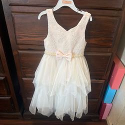 White lace and tulle dress with bow detail