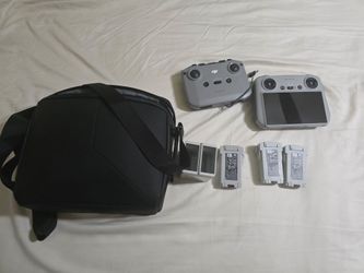 DJI mini 3 / 4 batteries, controllers, and bag