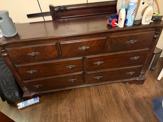 Dark wood dresser with mirror