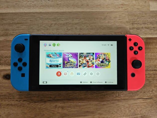 Nintendo Switch With 4 Controllers And Dock