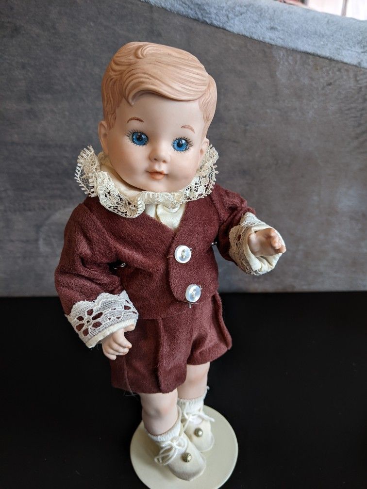 VTG Porcelain Boy W/Blue Eyes in Brown Velvet Short Set Doll w/Stand