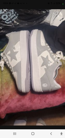 Is White and Metallic silver BapeSta Shoes