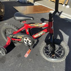 Children’s Huffy Bicycle With Training Wheels