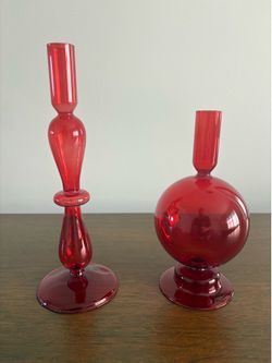 Two Red Candle Holders or Decorative Pieces