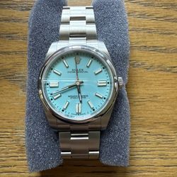 Rolex Oyster Perpetual 41 Am Turquoise Dial on Oyster Ref 124300 Serial No. 80K1J153