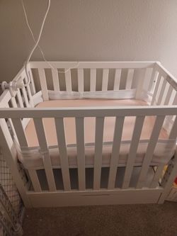 Mini Crib with mattress $100