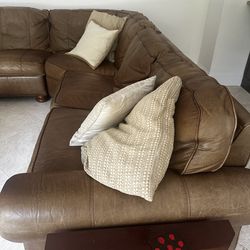 Large leather sectional sofa with recliners