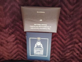 2 books presidential dollar collection/collection of uncirculated golden dollars Sacagawea book