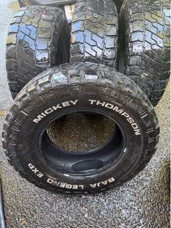 Mickey Thompson set of 4 tires (1 brand new, 3 worn but still usable)