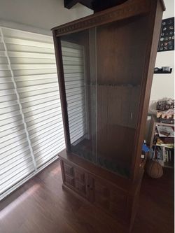 Wood rifle cabinet with glass $75
