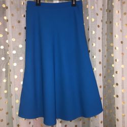 Royal blue size MEDIUM fully lined circle/skater skirt with a side zip. Worn once WAIST:28” LENGTH:28”