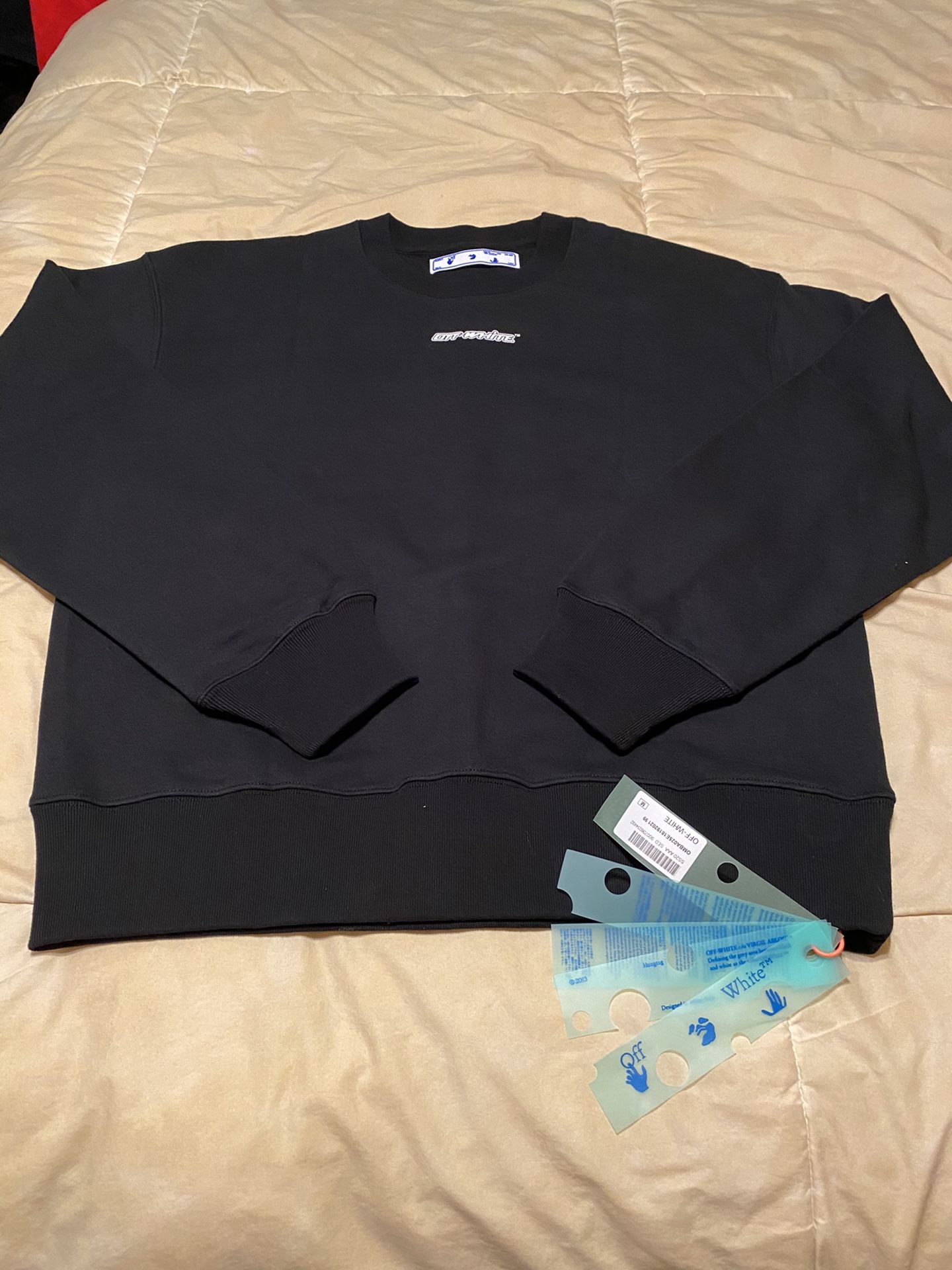 Off white sweatshirt Fits a medium & Large