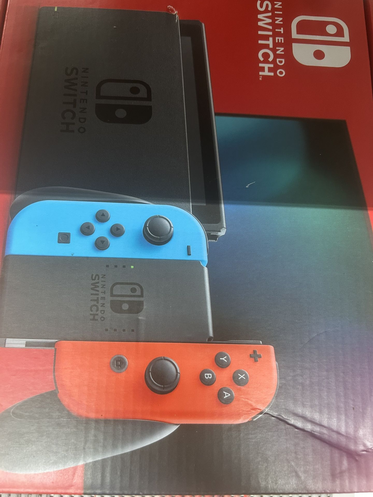 Nintendo Switch with Neon Blue and Neon Red Joy-Con