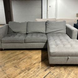 Delivery Available gray sectional couch and storage chaise