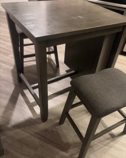 Table chair set with shelf