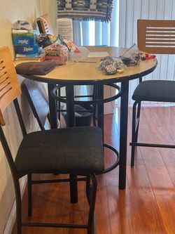Pub style table with 4 chairs
