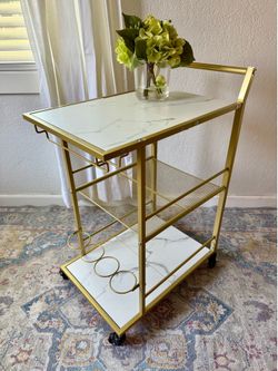 Bar cart rolling. Serving trolley