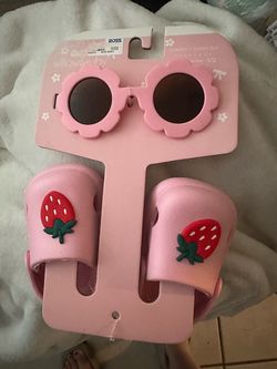 Baby /toddler brand new crocks and sun glasses $12 OBO
